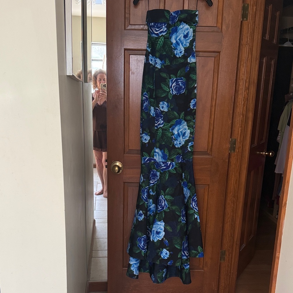 The most beautiful evening gown is too small on me and not returnable